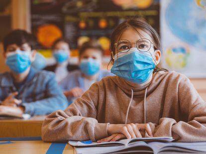 Students wear face masks in school