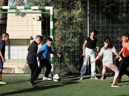 A group of children from Neve Shalom play soccer at the elementary school in this town, where Jews and Israeli Arabs have chosen to live together.