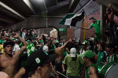 Fans of Atlético Nacional sing before the start of a match.