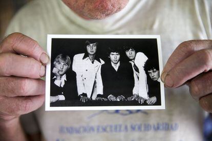 Chris with a photograph of the first Genesis lineup: he’s on the far right. He only played on one track, ‘The Silent Sun,’ which appeared on the band’s debut album. Since then, he says he’s never listened to their music.