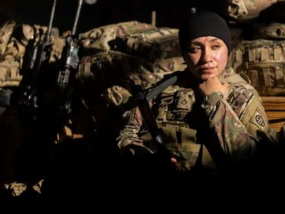 A member of the 82nd Airborne Division of the U.S. Army relaxes ahead of deployment to Poland from Fort Bragg, N.C. on Feb. 14, 2022.