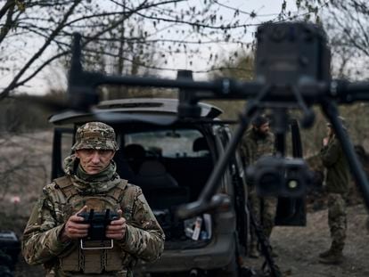 A Ukrainian soldier launches a drone in the area of the heaviest battles with Russian troops in Bakhmut, Donetsk region, Ukraine, on April 9, 2023.
