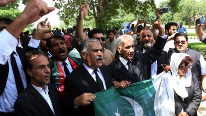 Lawyers supporting former Pakistan's Prime Minister Imran Khan react after Islamabad High Court suspended sentence against Khan, in Islamabad, Pakistan, on Aug. 29, 2023.