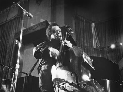 Charles Mingus (1922-1979) plays the double bass at a 1977 concert in Michigan.