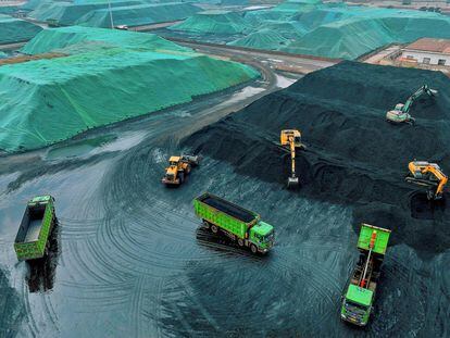 Trucks unload coal in Rugao, China, last November.