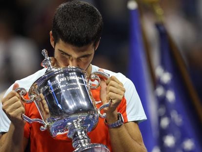 Spain's Carlos Alcaraz celebrates with the trophy after winning the US Open.