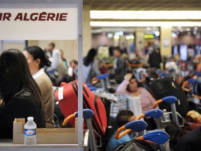 Passengers at an Air Algérie desk in a French airport in 2011.
