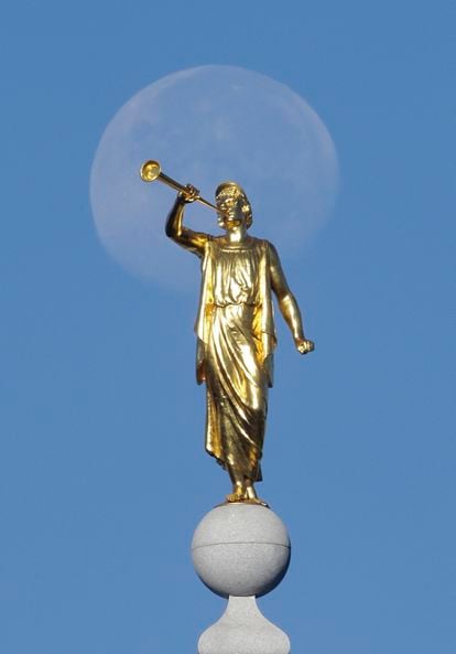 FILE - The angel Moroni statue sits atop the Salt Lake Temple of The Church of Jesus Christ of Latter-day Saints at Temple Square on Sept. 11, 2014, in Salt Lake City. The U.S. Securities and Exchange Commission says, Tuesday, Feb. 21, 2023, The Church of Jesus Christ of Latter-day Saints and its investment arm will pay $5 million in fines. The SEC alleges the church used shell companies to obscure the size of the portfolio under the church's control. (AP Photo/Rick Bowmer, File)