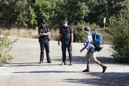 Police officers stationed along the Camino de Santiago.