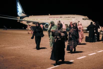 Sudanese, who had been stranded in Jeddah, Saudi Arabia, arrive at Port Sudan airport, on May 11, 2023.