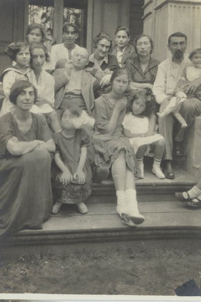 A 1924 photo of Emma Rabinovitch’s family (Berest’s great-grandmother) in Lodz, Poland. The author’s grandmother, Myriam, is the girl on the right, sitting on the stairs.
