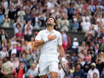 Serbia's Novak Djokovic celebrates after beating Russia's Andrey Rublev to win their men's singles match on day nine of the Wimbledon tennis championships in London, Tuesday, July 11, 2023.