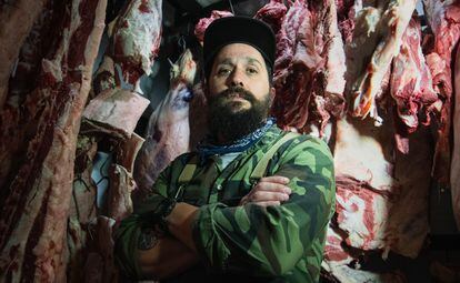 Ariel Agomaniz, owner of the Amic butcher shop.