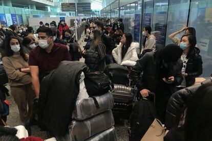 Passengers at the Guangzhou Baiyun airport in China's Guangdong province on December 25.