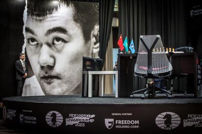 The stage stood empty in Astana while Ding considered his position from a monitor in the locker room.