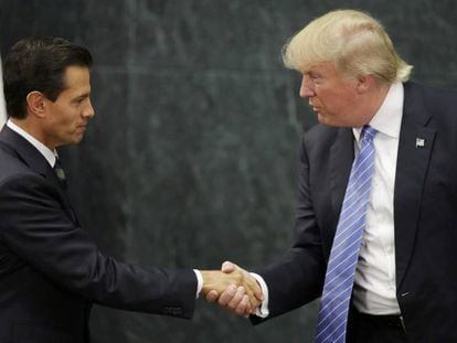 Enrique Peña Nieto and Donald Trump shaking hands in Mexico.
