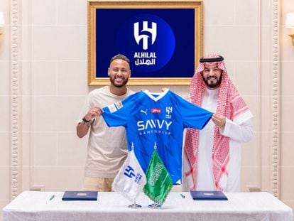 Neymar signs for Al Hilal, in Riyadh, Saudi Arabia, on August 15, 2023.