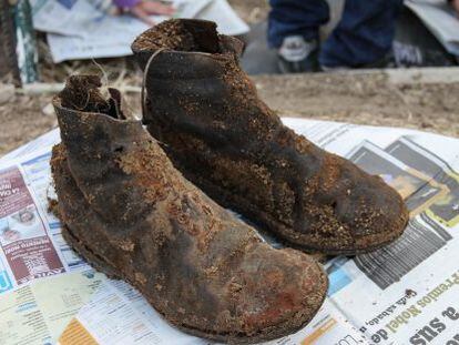 Boots that once belonged to Perfecto de Dios, whose remains were exhumed thanks to funding from a Norwegian union.