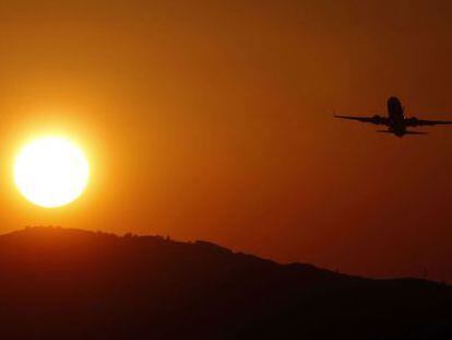 A passenger jet takes off from Manises Airport in Valencia.