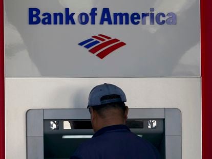 A customer uses an ATM at a Bank of America location in San Francisco, Monday, April 24, 2023.