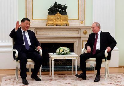 Chinese President Xi Jinping, left, with his Russian counterpart, Vladimir Putin, during their meeting in Moscow on Monday.