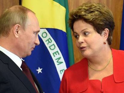 Putin with Brazilian president Dilma Rousseff.