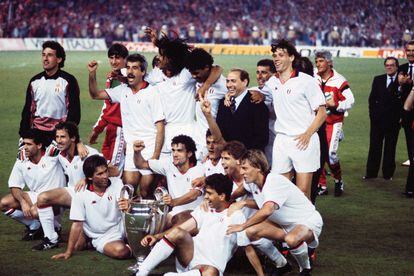 Silvio Berlusconi celebrates with AC Milan players and coach Carlo Ancelotti after the 1989 European Cup final against Steaua Bucharest. 