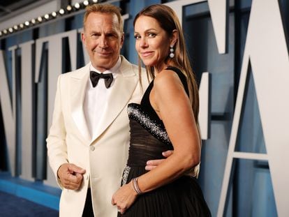 Kevin Costner and Christine Baumgartner at an Oscars after-party in Beverly Hills, California, in March 2022.