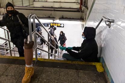 A homeless man inside a subway station in New York.