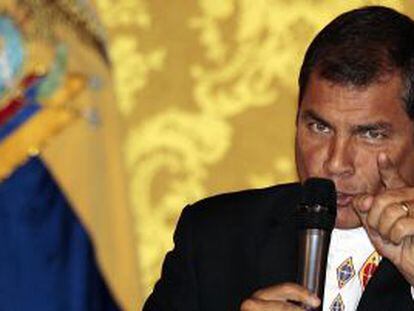 President Rafael Correa announces the pardon during a speech on Monday.