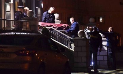 Police remove the body of David Byrne from the Regency Hotel in Dublin.