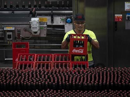 A worker at a Coca-Cola factory in Barcelona.