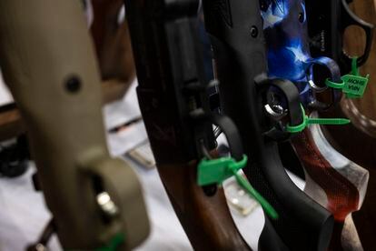 A rifle painted with the U.S. flag is displayed at the National Rifle Association (NRA) annual convention on May 28, 2022, in Houston, Texas.