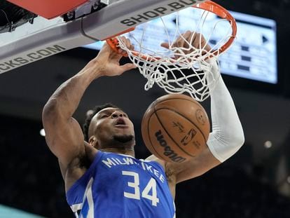 Milwaukee Bucks' Giannis Antetokounmpo dunks during the second half of an NBA basketball game against the San Antonio Spurs Wednesday, March 22, 2023, in Milwaukee.