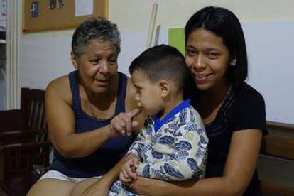 Susana Guevara (R) and her son in a shelter in Cúcuta, Colombia.