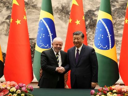 Brazilian President Luiz Inácio Lula da Silva, left, shakes hands with Chinese President Xi Jinping after a signing ceremony held at the Great Hall of the People in Beijing, on April 14, 2023.