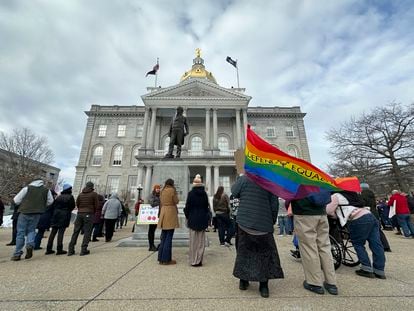 Advocates for transgender youth rally outside the New Hampshire Statehouse, in Concord, N.H., Tuesday, March 7, 2023.