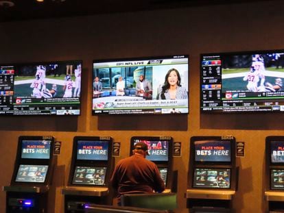 A gambler makes bets at a kiosk in the Ocean Casino Resort in Atlantic City, New Jersey, on February 6, 2023.