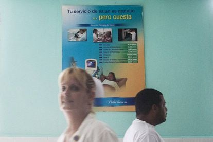 Cuba's health service is free, but as a poster behind this nurse points out, it is expensive.