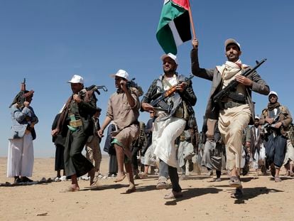 Houthi fighters march during a rally of support for the Palestinians in the Gaza Strip and against the U.S. strikes on Yemen outside Sanaa on Jan. 22, 2024.