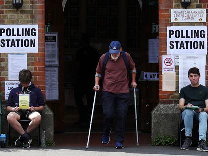 A man exits a polling station during a by-election for Britain's parliamentary constituency of Uxbridge, in Uxbridge, west London, Britain, 20 July 2023.