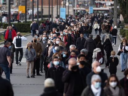 People line up to get vaccinated in Barcelona.