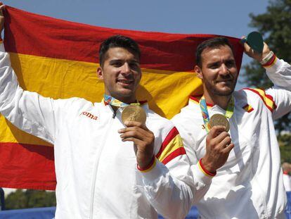 Saúl Craviotto and Cristian Toro celebrate their win.