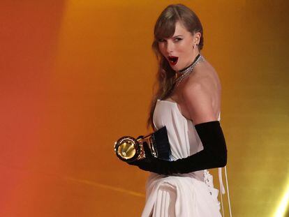Taylor Swift accepting the award for best pop album at the 66th Grammy Awards in Los Angeles, California on February 4, 2024.
