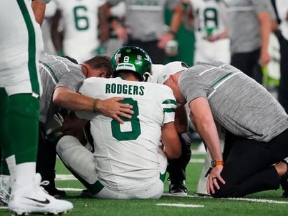 New York Jets quarterback Aaron Rodgers (8) is injured after a sack by Buffalo Bills defensive end Leonard Floyd (not pictured) during the first quarter at MetLife Stadium, Sep. 11, 2023.