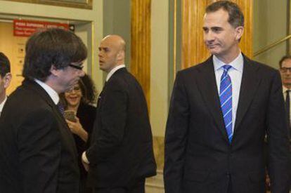 Felipe VI (right) coincided with Catalan premier Carles Puigdemont at the MWC inauguration dinner.