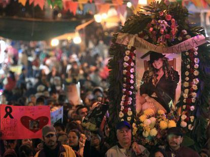 Fans of Mexican-US singer Jenni Rivera follow a memorial procession  in Monterry, Mexico