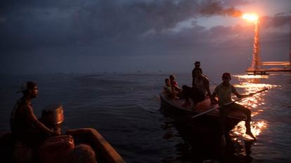 Fishermen near a PDVSA oil rig in Lake Maracaibo, Venezuela, in May of 2019.
