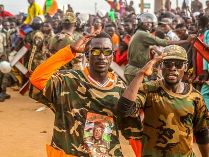 Niger's junta supporters take part in a demonstration in front of a French army base in Niamey, Niger, August 11, 2023.