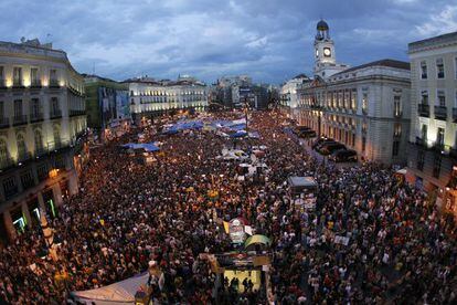 Madrid&#039;s Puerta de Sol throngs with protestors during the camp out last year.